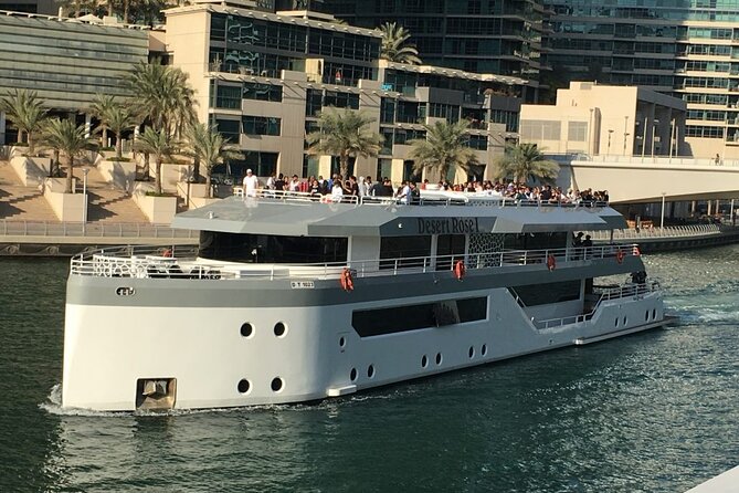 Luxury 7 Star Mega Yacht Dinner Cruise with International Buffet - Tanura dancing, live singing, and background music