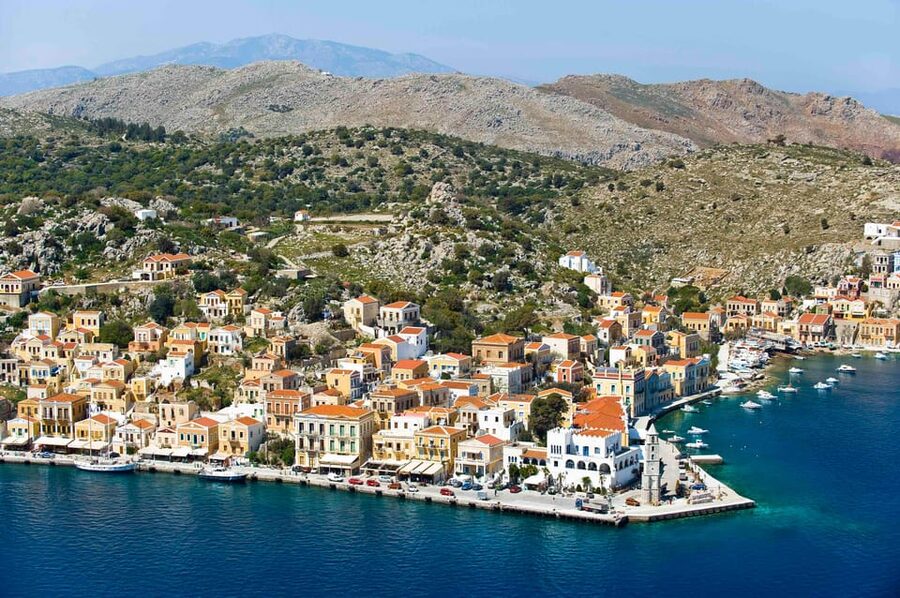 Luxury Boat Trip to Symi Island with Swimming at St. George - Approaching Symi Harbour