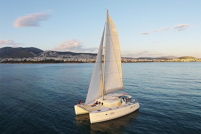 Luxury Catamaran Cruise from Athens with Traditional Greek Meal and BBQ - Sailing past Voula and Vouliagmeni