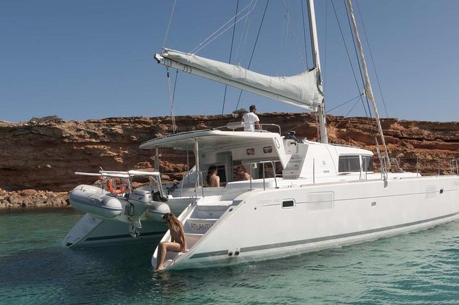 Luxury Catamaran Semi private cruise with meals & drinks and transportation. - Delos from the water, not from the ruins