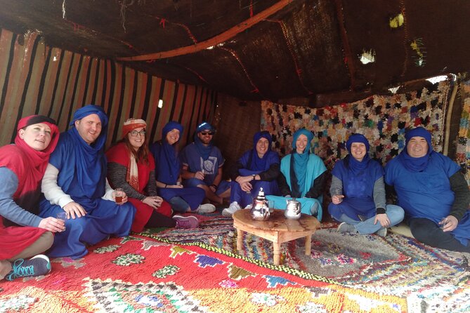 Luxury day trip: Three valleys & camel ride Agafay Desert - Camel riding at sunset in rocky Agafay