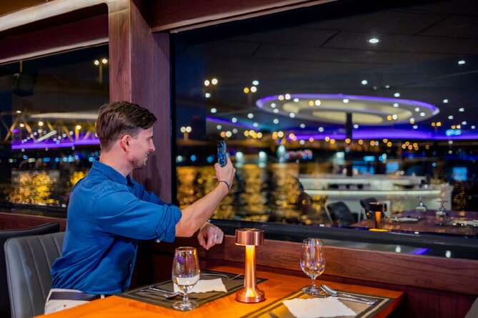Luxury Dinner Cruise with Guide and Transfer (Opt. Executive Van) - Boarding at ICONSIAM and settling in for dinner