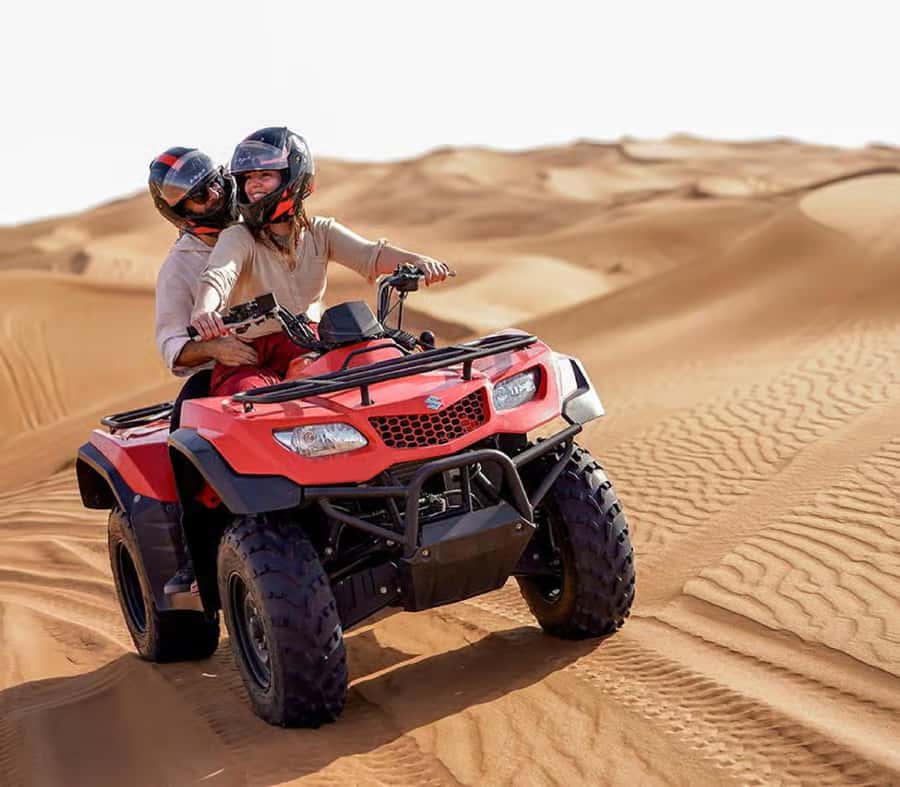 Luxury Dubai Desert Safari, BBQ, Camel Ride, Quad Bike, Show - 4x4 dune bashing and the quad bike option