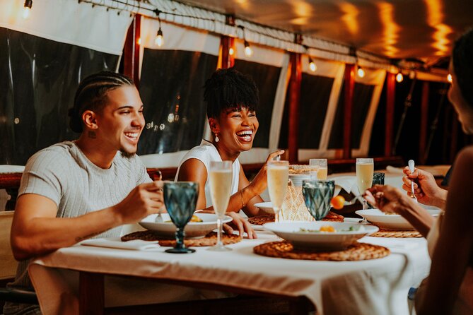 Luxury Four-Course Caribbean Dinner Cruise Experience - Live music and the changing mood after sunset
