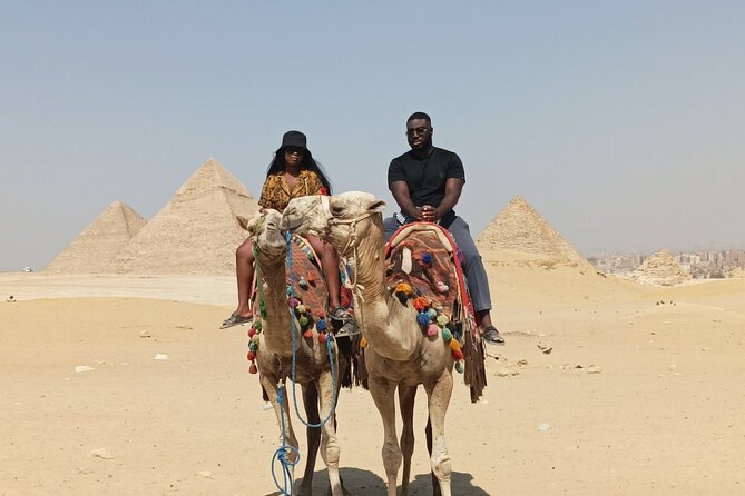 Luxury Half Day Tour to Giza Pyramids and sphinx with Camel Ride - Lunch, water, and the $10 value