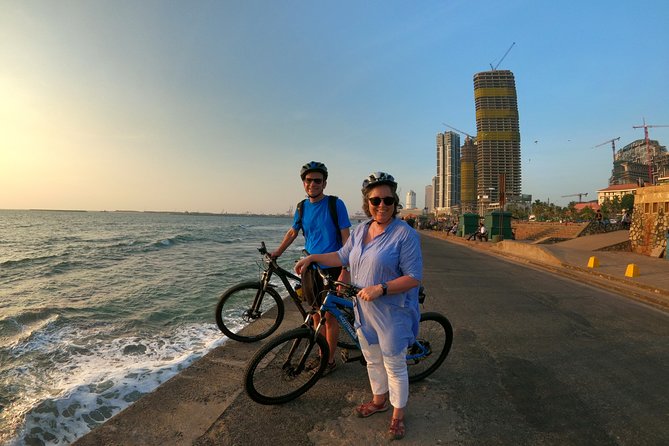 Luxury Night Cycle Tour of Colombo - Gangaramaya Temple beside Beira Lake