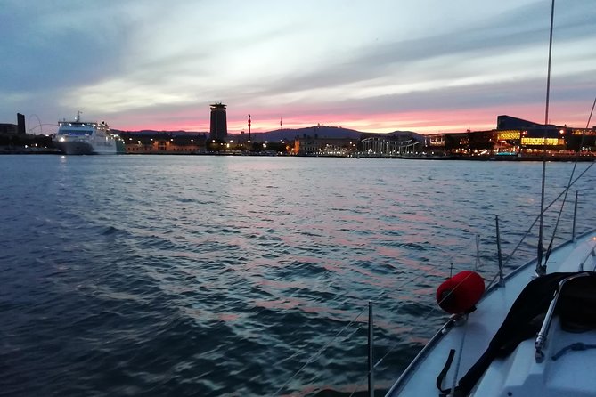 Luxury Private Sunset Cruise in Barcelona – Open Bar Included - Passing the white commercial-port drawbridge