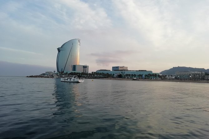 Luxury Private Sunset Cruise in Barcelona – Open Bar Included - Barcelona’s skyline from open water