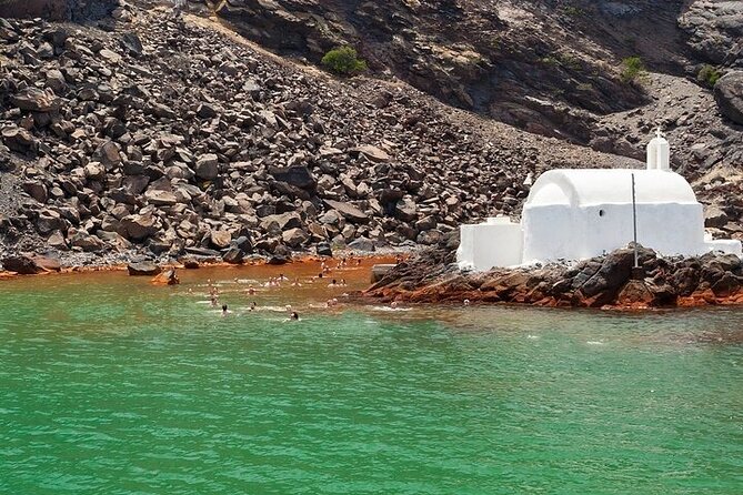Luxury Small-Group Catamaran Cruise with BBQ, Open bar & Transfer - Red Beach, White Beach, and the volcanic coast