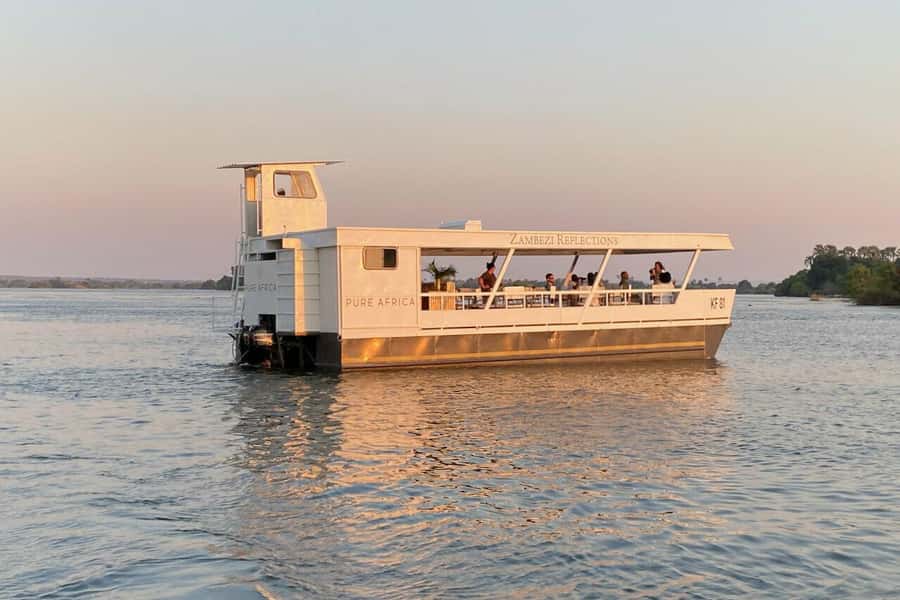 Luxury Sunset Dinner Cruise with 4-Course Meal - Cruising upstream on the Zambezi