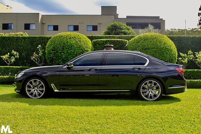 Luxury Sydney Airport Arrival Transfer - Sedan/SUV - From baggage claim to a clean private car