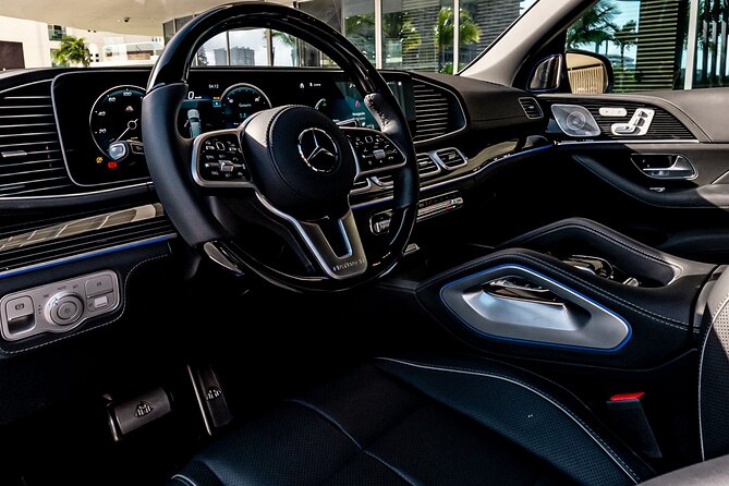 Luxury Transfers in a Mercedes Maybach GLS 600 - Drivers Alfredo and Edgar add personality
