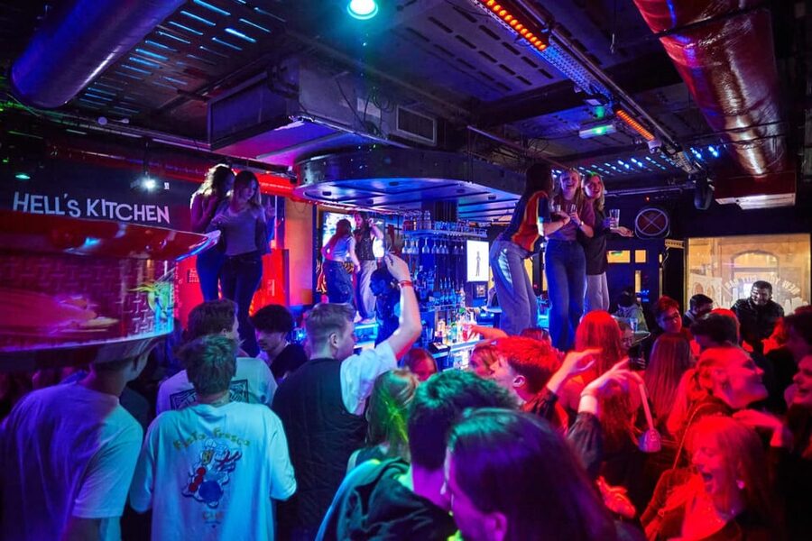 Lyon: Riviera Bar Crawl Party with Free Shots and Vip Entry - Starting the night in Lyon with a guide in red