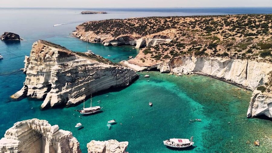 Milos: Full Day Luxury Catamaran with Full Meal & Open Bar - Triades Beach brings the first swim