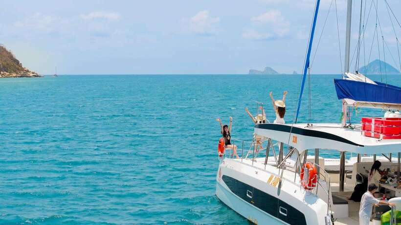 Nha Trang: VIP YACHT TOUR ( BBQ, Water activities) - Champagne, fruit, and a relaxed yacht atmosphere