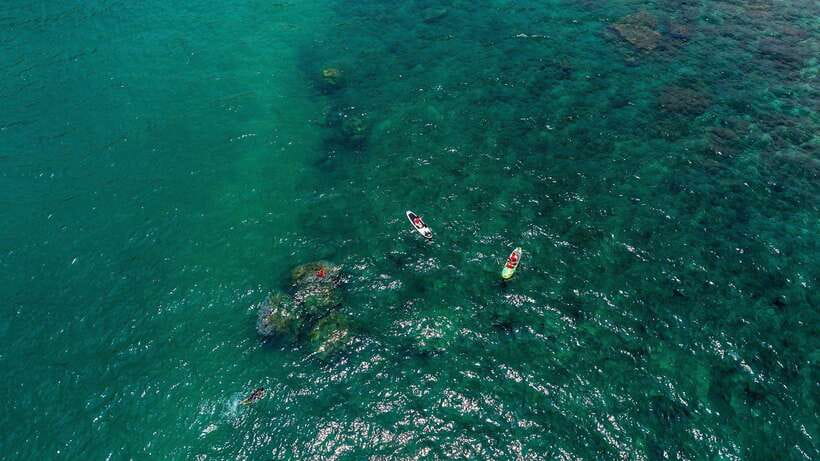 Nha Trang: VIP YACHT TOUR ( BBQ, Water activities) - SUP, snorkeling, swimming, and the yacht slide