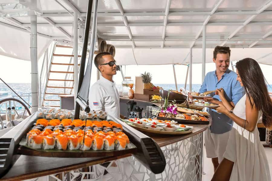 Phuket: Coral and Racha Islands Hype Luxury Catamaran - Coral Island: pretty sand, but check the water before swimming