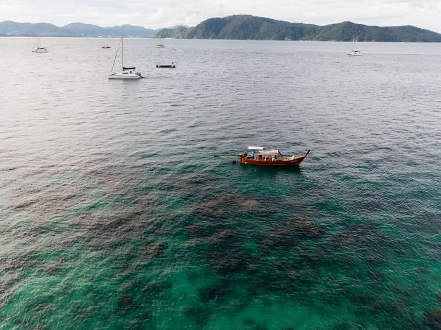 Phuket: Coral Island Luxury Long Tail Boat Half-Day Tour - Coral Island’s beaches and clear water