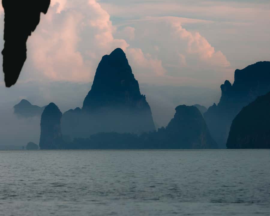 Phuket: Luxury Small Group Phang Nga and Beyond Tour - A swim through a narrow passage