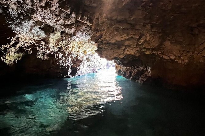 Polignano a Mare luxury boat tour, aperitif, diving and snorkeling - Prosecco, tarallini, and music on board