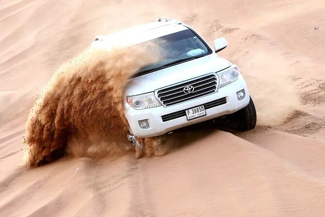 Premium Evening Desert Safari, Quad Bike, Camel & VIP BBQ Dinner - Red dunes first, Arabian night later