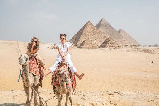 Private Day Tour to Giza Pyramids, Sphinx & Saqqara + Luxury Nile Dinner Cruise - Three pyramids and the wide Giza view