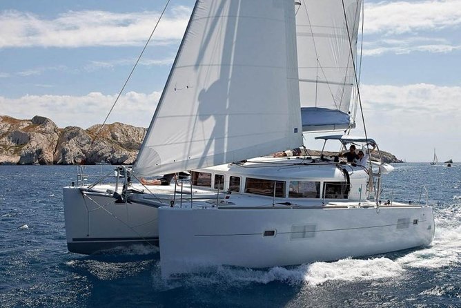 Private Luxury Santorini Catamaran Cruise with Port Pickup - Red Beach and Santorini’s volcanic south coast