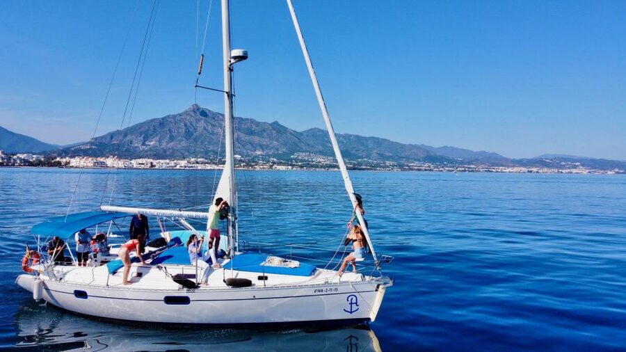 Puerto Banús by Sailboat: Discover Marbella’s Luxury Coast - Swimming and paddleboarding at Playa Puerto Banús