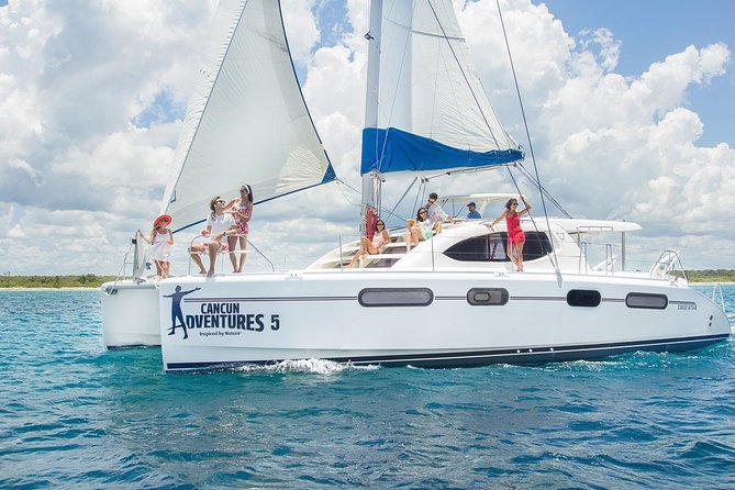 Riviera Maya Luxury Snorkeling Cruise with Lunch and Drinks - The second stop: paddleboards, mats, and calmer water