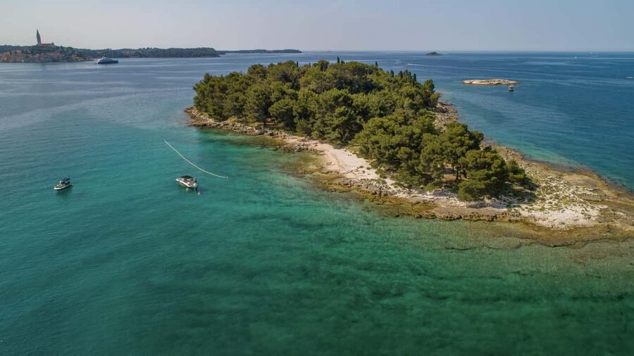 Rovinj: Luxury Island Hopping with Swimming & Snorkeling - Golden Cape and the first coastal views