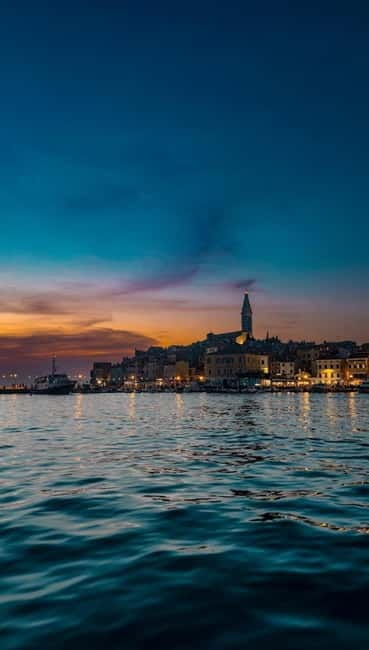 Rovinj: Private Luxury Old Town Night Boat Tour with Wine - Meeting the Skipper at Mali Mol or Delfin Dock Station