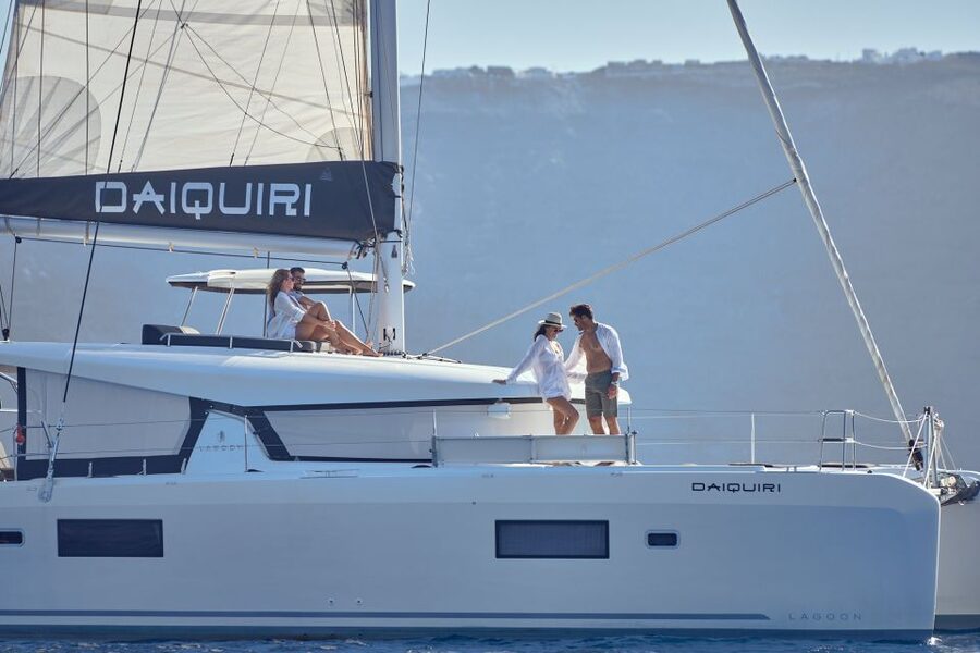 Santorini: Day Luxury Catamaran Cruise with Meal & Drinks - Setting sail from Ammoudi Bay