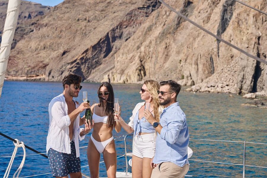 Santorini: Day Luxury Catamaran Cruise with Meal & Drinks - Black lava and Santorini’s volcanic islets