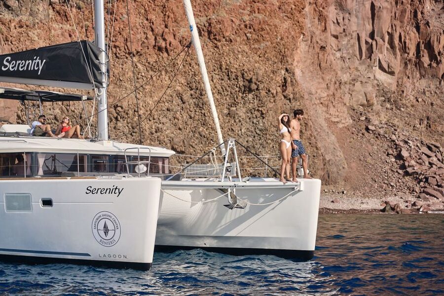 Santorini: Day Luxury Catamaran Cruise with Meal & Drinks - The caldera views on the way back