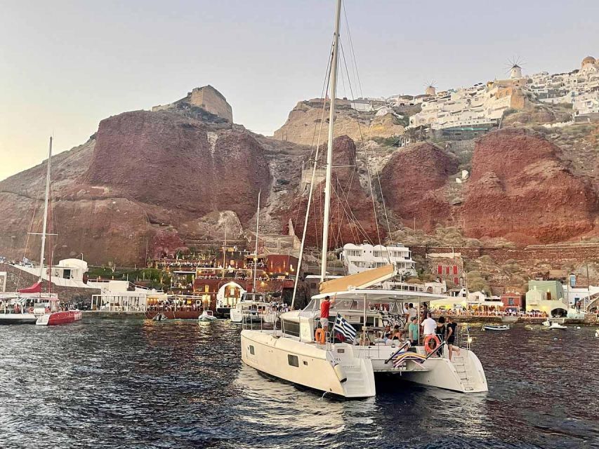 Santorini: Luxury Caldera Cruise with Full Greek Meal - Red Beach adds a second kind of swim