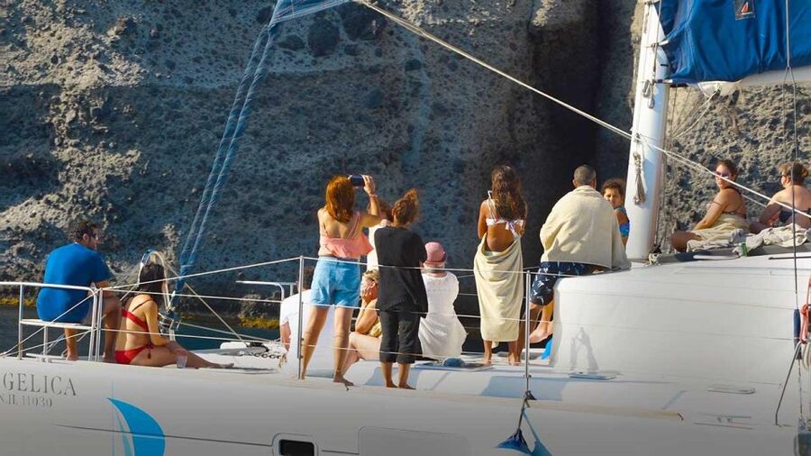 Santorini: Luxury Caldera Cruise with Full Greek Meal - Hotel pickup can save time, but plan for delays