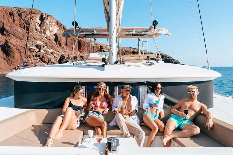 Santorini: Luxury Catamaran Cruise with Lunch, BBQ & Drinks - Red Beach and the Southern Coast by Boat