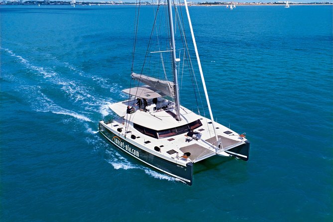 Santorini Luxury Catamaran Day Cruise with BBQ,drinks,transfer - Swimming at the Hot Springs