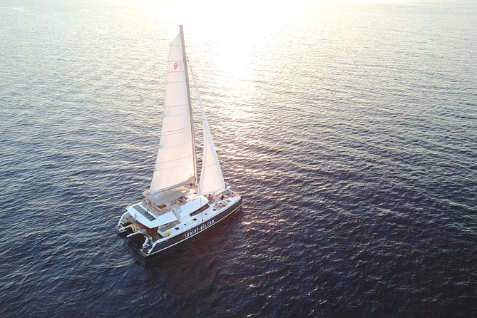 Santorini Luxury Catamaran Day Cruise with BBQ,drinks,transfer - Sailing past the volcano and Palea Kameni