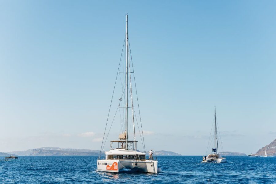 Santorini: Luxury Catamaran Day Trip with Meal and Open Bar - Why seeing Santorini from the water matters