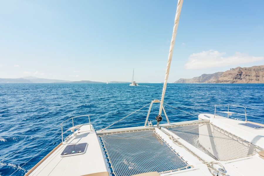 Santorini: Luxury Catamaran Day Trip with Meal and Open Bar - Red Beach and White Beach from the sea