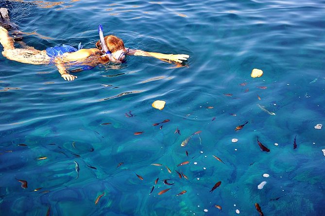 Santorini Luxury Catamaran Sunset Cruise with BBQ, Drink and Transfer - White Beach, BBQ, and the longest stop
