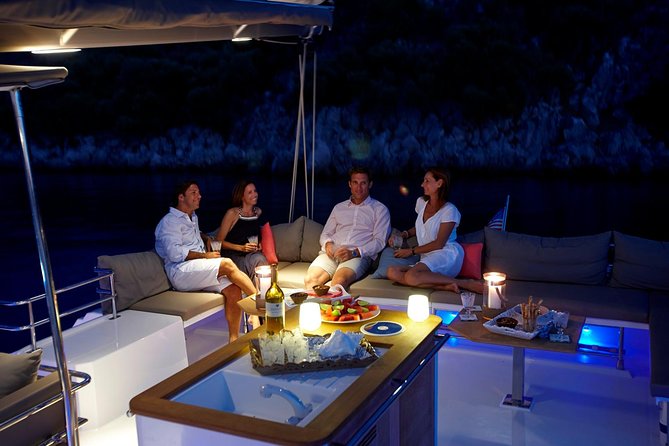 Santorini Luxury Catamaran Sunset Cruise with BBQ, Drink and Transfer - Crew service and the mood onboard