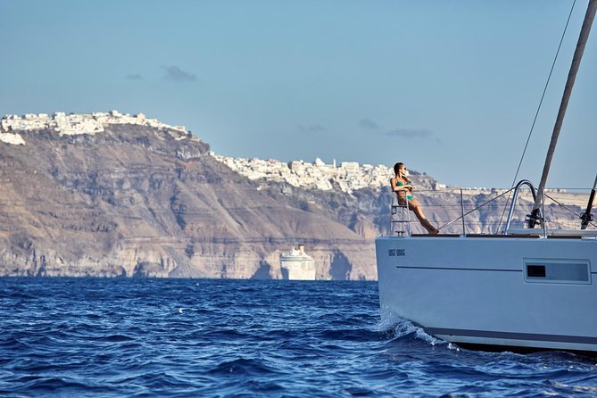 Santorini Luxury Sailing Catamaran Cruise with BBQ, Drinks and Transfer - Red Beach and the final swim