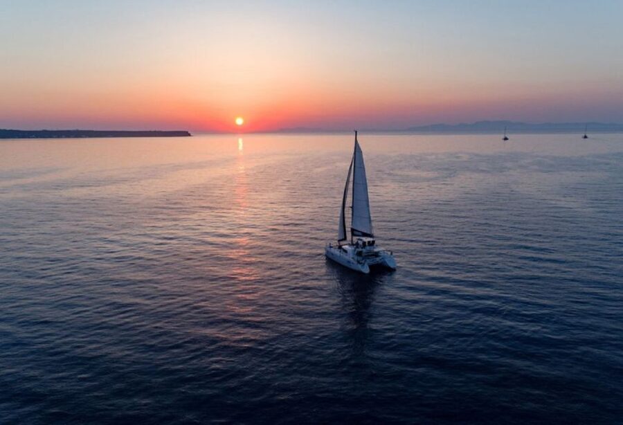 Santorini: Luxury Sunset Cruise with Dinner & Open Bar - Red Beach, White Beach, and Black Mountain Beach