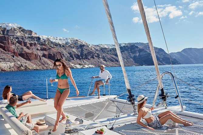 Santorini Sunset Luxury Sailing Catamaran Cruise with BBQ, drinks, transfer - Why a catamaran is a smart way to see Santorini