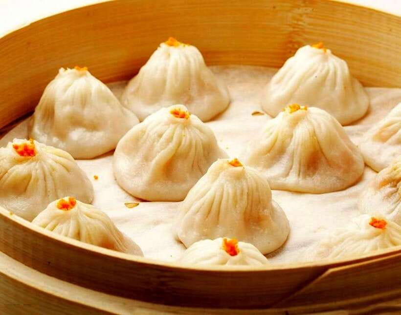 Shanghai Night River Cruise VIP Seat with Authentic Dinner - Dinner turns sightseeing into a food experience