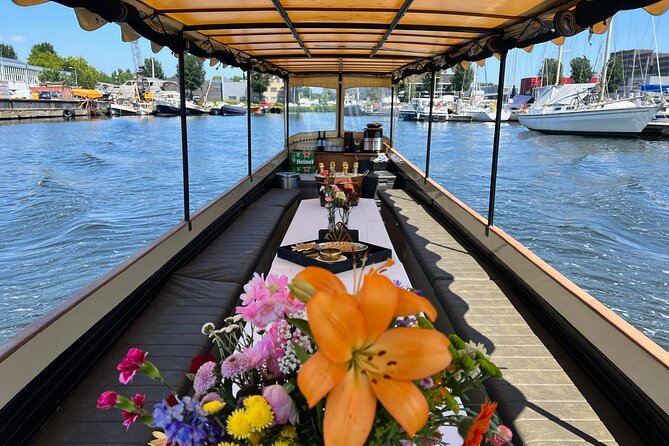 Small-Group Luxury Canal Cruise with Local Skipper - Crooked houses near the Amstel add local character