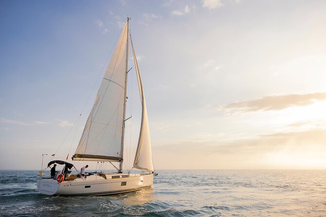 Sunset On A Luxury Sailboat From Port Olimpic - What You See Along Barcelona’s Coast