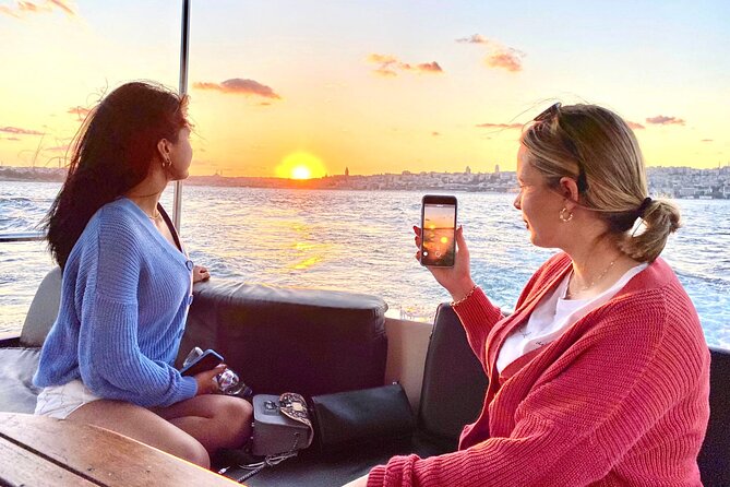 Sunset or Daytime Istanbul Guided Luxury Yacht Cruise with Snacks - Passing beneath Istanbul’s two great bridges